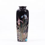 Black flower vase.