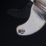 6-piece set of silver swizzle sticks on stand. 800 silver fineness mark. Total weight: 196 g. Height: 18 cm.
