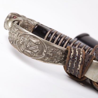 Imperial German Eagle Head sword with damascus blade.
