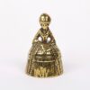 Antique brass bell in a shape of a women