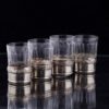 (English) 4 French silver and glass beakers