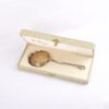 French silver serving spoon in the shape of a shell
