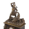 Antique large mantel clock made of bronze and black marble depicting a battle between a crusader and a Turk or Moor.
