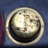 Antique large mantel clock made of bronze and black marble depicting a battle between a crusader and a Turk or Moor.