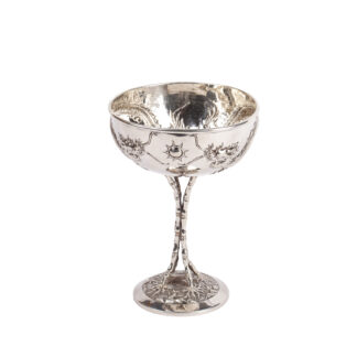 A nice Antique Silver Chinese Wine Glass. It has two Dragons and sun, bamboo ornament. Very nice and detailed work. 