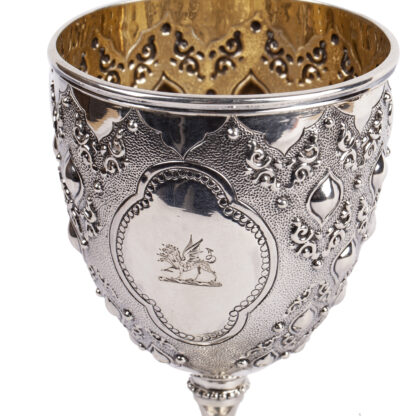 A Nice Antique English Silver with gilding Wine glass in Chinese motifs. It has a nice engraved Flying dragon.