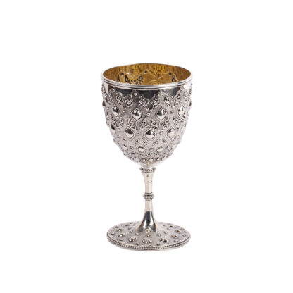 A Nice Antique English Silver with gilding Wine glass in Chinese motifs. It has a nice engraved Flying dragon.