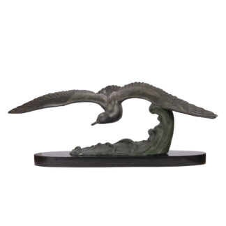 A Nice Signed Spelter Sculpture of the Flying seagull on black stone base. Signed M. LEDUCQ (1879-1955), a French sculptor.