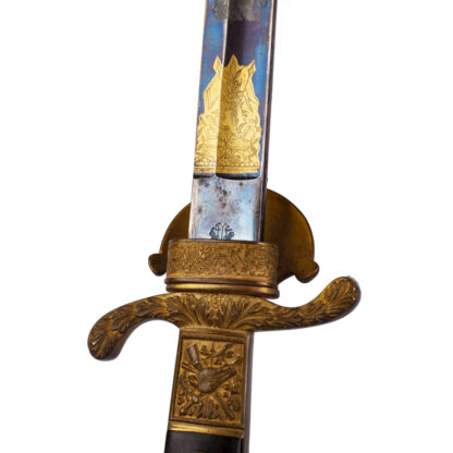 A Bavarian presentation hirswanger, dagger, sword with decorated blue gilding blade