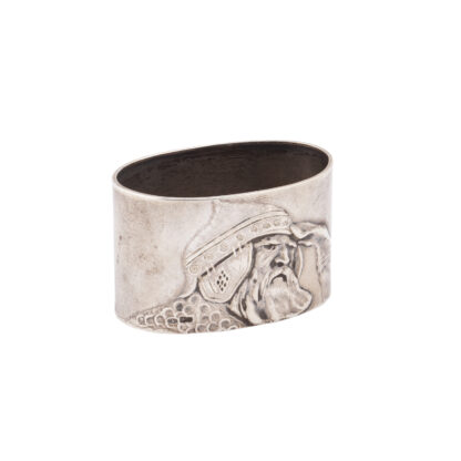 A Russian cast silver napkin ring from the series of “Bogatir zastava”. Makers mark of M. Tarasov. Moscow, 1908-1917. Dimensions: 3.7 x 6 x 3.5 cm. Weight: 32.5 g.