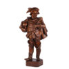 Large hand carved wooden figure of a man with a beer cup