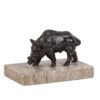 A small bronze figure of a wild boar on a stone stand