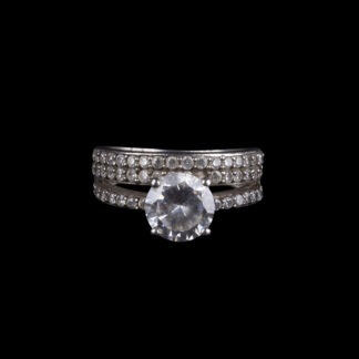 925 Sterling Silver Ring with Large Round Clear Stone and Three Rows of Small Stones